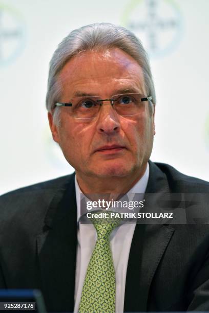 German chemicals giant Bayer's board member responsible for Human Resources, Technology and Sustainability, Hartmut Klusik, listens during the...