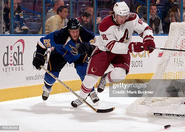 Sami Lepisto of the Phoenix Coyotes skates against Yan Stastny of the St. Louis Blues on October 29, 2009 at Scottrade Center in St. Louis, Missouri.