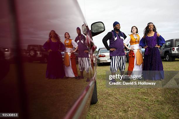 Robert Rochester, Elisabeth Pacana and Laurianne Hebel show off their outfits at the Maryland Renaissance Faire on September 26, 2009 outside of...