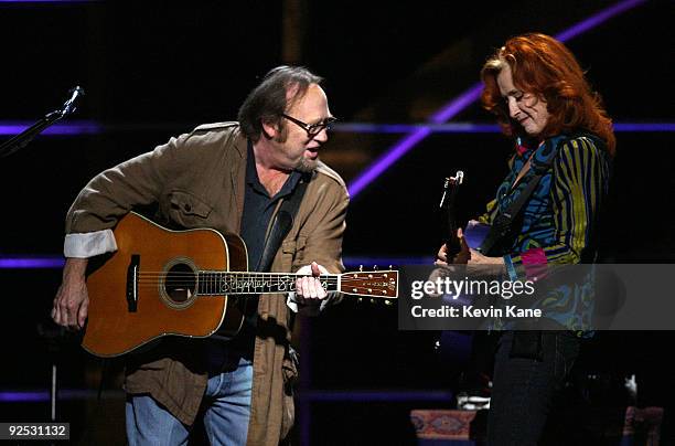 Stephen Stills of Crosby, Stills and Nash with Bonnie Raitt performs onstage at the 25th Anniversary Rock & Roll Hall of Fame Concert at Madison...