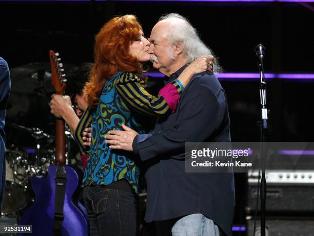 David Crosby of Crosby, Stills and Nash with Bonnie Raitt onstage at the 25th Anniversary Rock & Roll Hall of Fame Concert at Madison Square Garden...