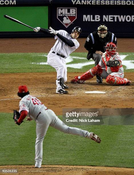 Mark Teixeira of the New York Yankees hits a solo home run in the fourth inning against the Philadelphia Phillies in Game Two of the 2009 MLB World...