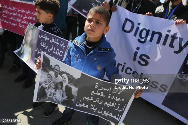 Palestinians take part in a protest against a U.S. Decision to cut aid, in front of the headquarters United Nations Relief and Works Agency in Gaza...