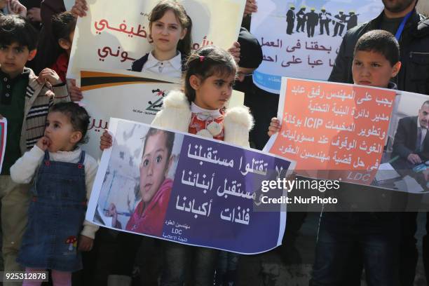 Palestinians take part in a protest against a U.S. Decision to cut aid, in front of the headquarters United Nations Relief and Works Agency in Gaza...