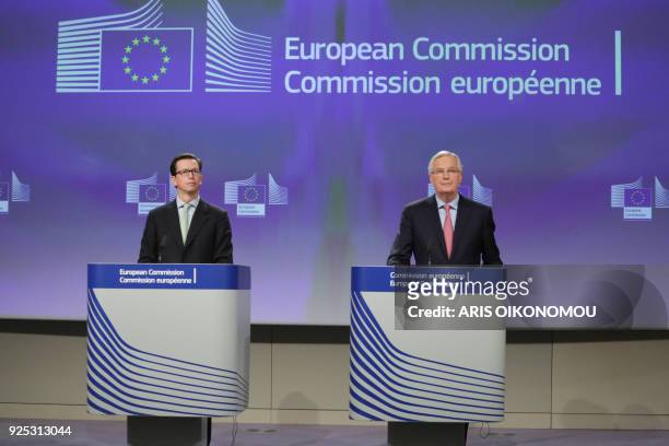 European Union Chief Negotiator in charge of Brexit negotiations, Michel Barnier speaks beside EU deputy chief spokesperson Alexander Winterstein...
