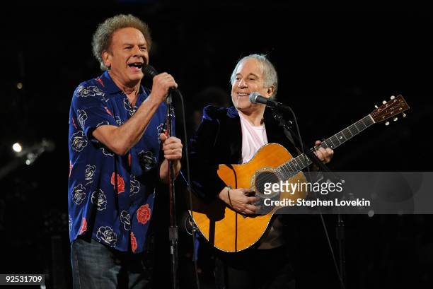Art Garfunkel and Paul Simon perform onstage at the 25th Anniversary Rock & Roll Hall of Fame Concert at Madison Square Garden on October 29, 2009 in...