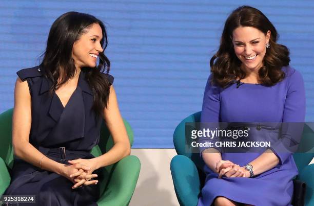 Actress and fiancee of Britain's Prince Harry Meghan Markle and Britain's Catherine, Duchess of Cambridge attend the first annual Royal Foundation...