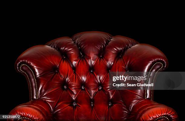 red leather armchair - antique sofa styles foto e immagini stock