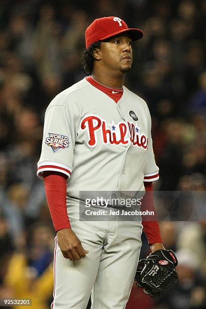 Starting pitcher Pedro Martinez of the Philadelphia Phillies looks on after giving up a home run in the sixth inning against the New York Yankees in...