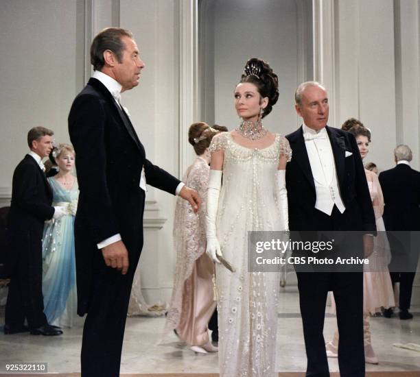 From left to right: Rex Harrison as Professor Henry Higgins, Audrey Hepburn as Eliza Doolittle and Wilfrid Hyde-White as Colonel Hugh Pickering in...