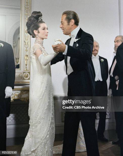 Rex Harrison as Professor Henry Higgins and Audrey Hepburn as Eliza Doolittle in "My Fair Lady". Original release date December 25, 1964.