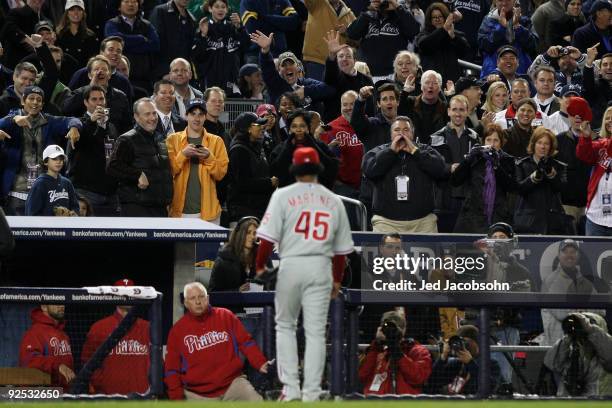 Starting pitcher Pedro Martinez of the Philadelphia Phillies is heckled by fans as he comes out of the game in the seventh inning against the New...