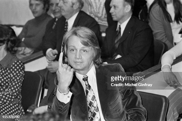 French singer Claude François is attending, as president of the tournament, a volleyball match between journalists and artists, 22nd March 1972