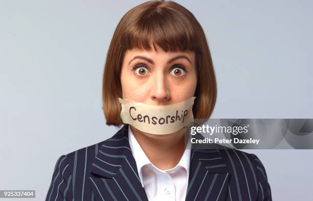 censorship shock /whistleblower prevention - gagged woman stock pictures, royalty-free photos & images