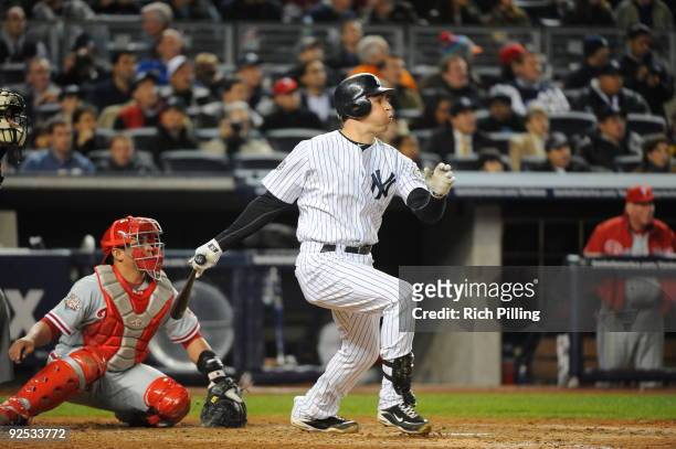 Mark Teixeira of the New York Yankees hits a home run in the bottom of the fourth inning of Game Two of the 2009 MLB World Series at Yankee Stadium...