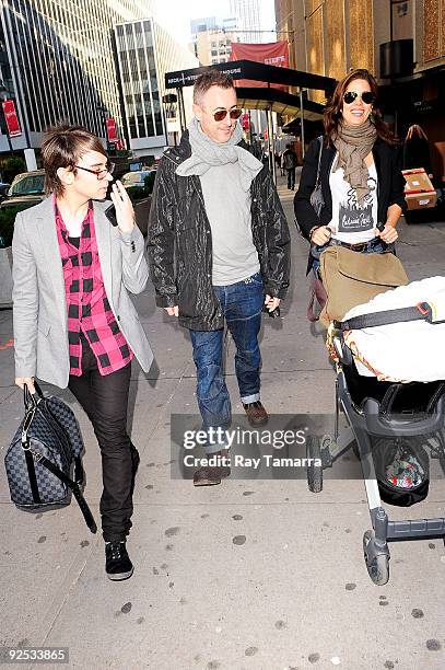 Designer Christian Siriano, actor Alan Cumming, and actress Ana Ortiz leave Madison Square Garden on October 29, 2009 in New York City.