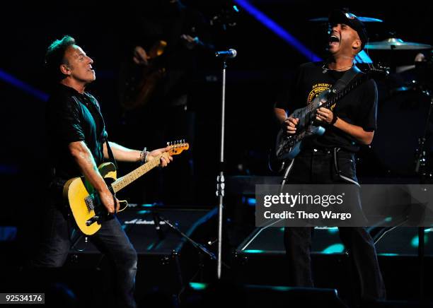 Tom Morello performs onstage with Bruce Springsteen and the E Street Band at the 25th Anniversary Rock & Roll Hall of Fame Concert at Madison Square...