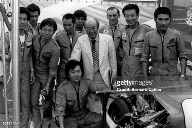 Soichiro Honda, Grand Prix of Great Britain, Brands Hatch, 13 July 1980. Soichiro Honda surrounded by Honda motorcycle Grand Prix mechanics.