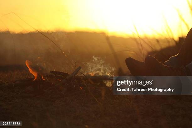 campfire and hiker shoes - binoculars icon stock pictures, royalty-free photos & images