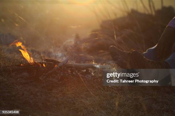 campfire and hiker shoes - binoculars icon stock pictures, royalty-free photos & images