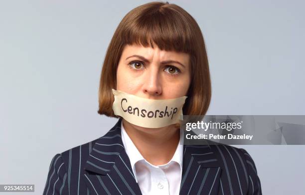 censorship frustration - dispositivo de control fotografías e imágenes de stock