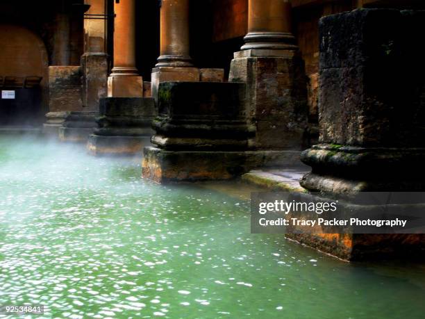 the roman baths, at bath in england. - bath england fotografías e imágenes de stock