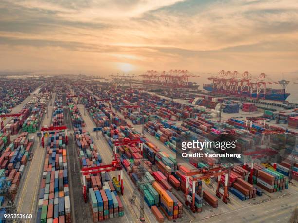 beautiful sunset at shanghai container port.shanghai container port rank 1st biggist container port around the world in 2017 - shanghai port stock pictures, royalty-free photos & images