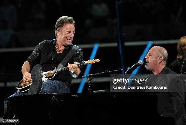 Bruce Springsteen and the E Street band with Billy Joel perform onstage at the 25th Anniversary Rock & Roll Hall of Fame Concert at Madison Square...