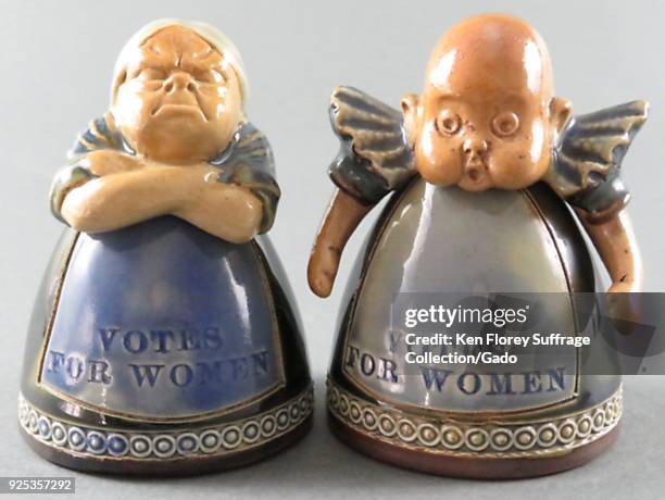 Pair of ceramic inkwells caricaturing suffragettes as stock characters, "The Harridan" and "The Baby, " each with a caption at the base reading...