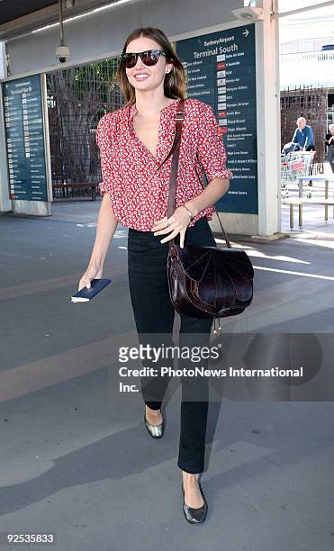 Model Miranda Kerr arrives at Sydney International Airport ahead of her appearance at the Caulfield Cup this weekend, on October 14, 2009 in Sydney,...