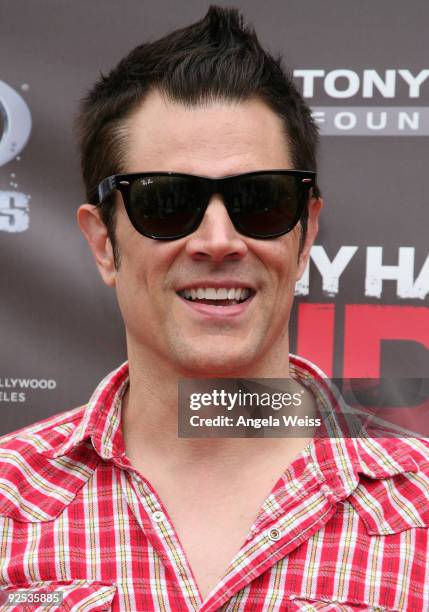 Actor Johnny Knoxville arrives to the 'Tony Hawk: Ride Presents Stand Up For Skateparks' benefit press conference held at the Green Acres Estate on...