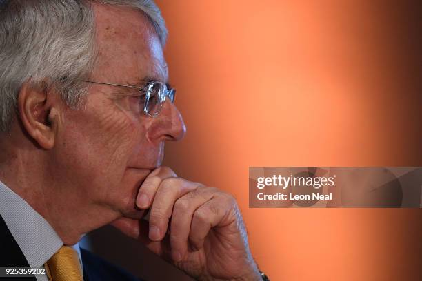 Sir John Major listens after giving a speech on Brexit at Somerset House on February 28, 2018 in London, England. The former Conservative Prime...