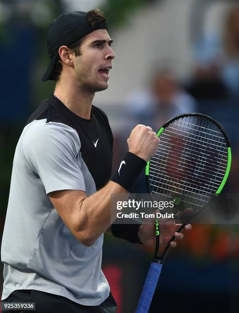 Karen Khachanov of Russia celebrates a point during his match against Lucas Pouille of France on day three of the ATP Dubai Duty Free Tennis...