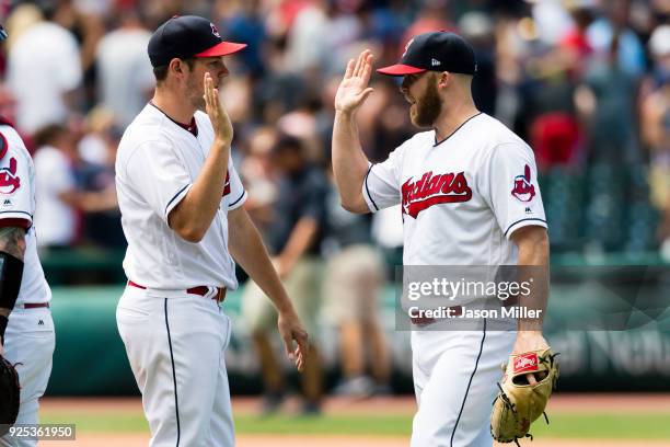 Starting pitcher Trevor Bauer and closing pitcher Cody Allen of the Cleveland Indians celebrate after the Indians defeated the Los Angeles Angels of...