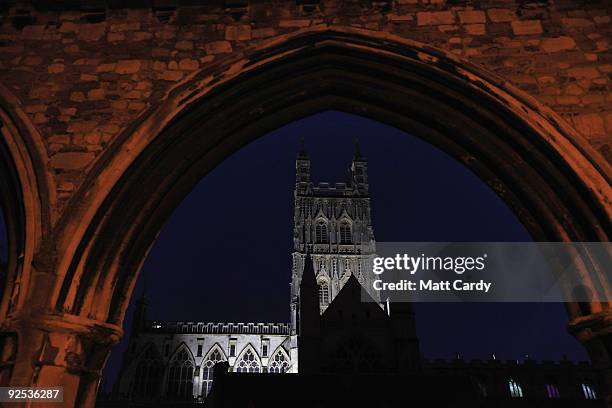 Flood lights illuminate the exterior of Gloucester Cathedral as Harry Potter and the Half-Blood Prince is shown on a giant screen inside on October...