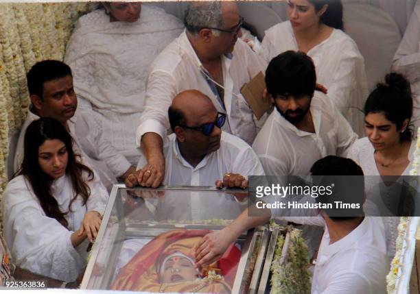 Bollywood filmmaker and husband Boney Kapoor with daughters Jhanvi and Khushi during funeral of the late Bollywood actress Sridevi Kapoor passes...