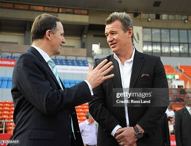 New Zealand Prime Minister John Key speaks with former All Black and Japan National Rugby Coach John Kirwan during a New Zealand All Blacks Captain's...