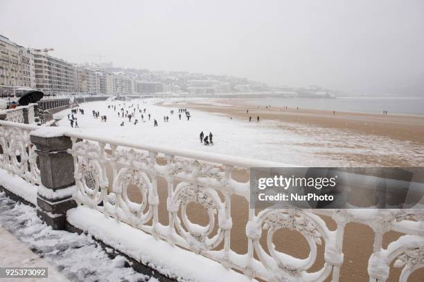 Snow storm leaves the beach of the shell under a white robe in San Sebastian, Spain, at February 28, 2018