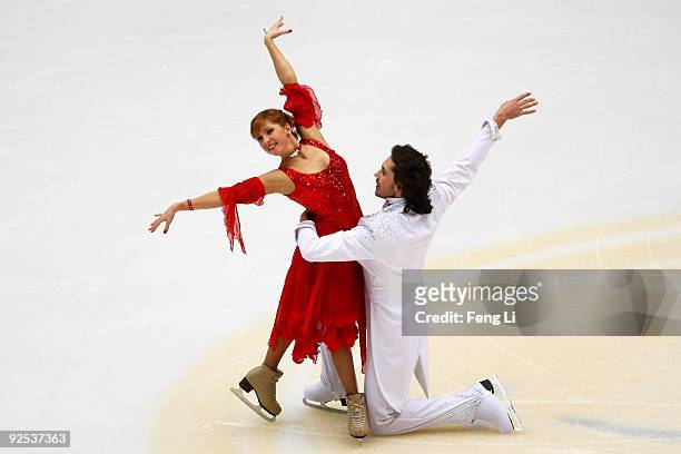 Jana Khokhlova and Sergei Novitski of Russia skate in the Ice Dancing Compulsory Dance during the Cup of China ISU Grand Prix of Figure Skating 2009...