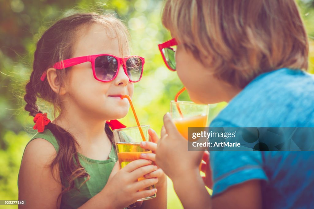 Children drinking juice