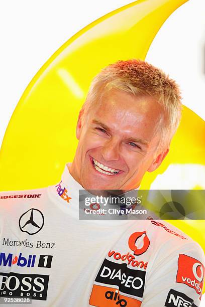 Heikki Kovalainen of Finland and McLaren Mercedes prepares to drive during practice for the Abu Dhabi Formula One Grand Prix at the Yas Marina...