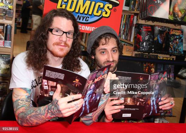 Drummer Andy Hurley and lead guitarist Joe Trohman of Fall Out Boy promotes "FOB Presents Fall Out Toy Works" at Midtown Comics on September 3, 2009...