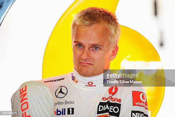 Heikki Kovalainen of Finland and McLaren Mercedes prepares to drive during practice for the Abu Dhabi Formula One Grand Prix at the Yas Marina...