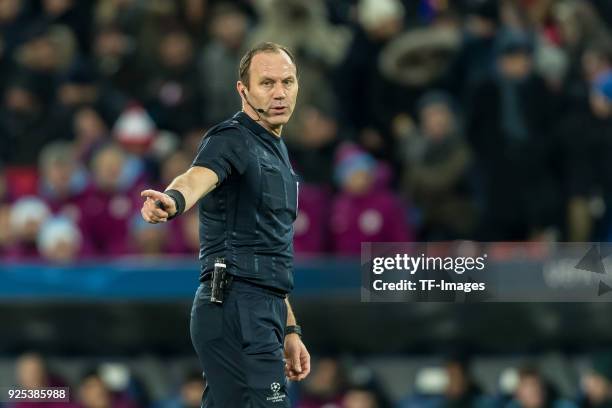 Referee Jonas Eriksson gestures during the UEFA Champions League Round of 16 First Leg match between FC Basel and Manchester City at St. Jakob-Park...