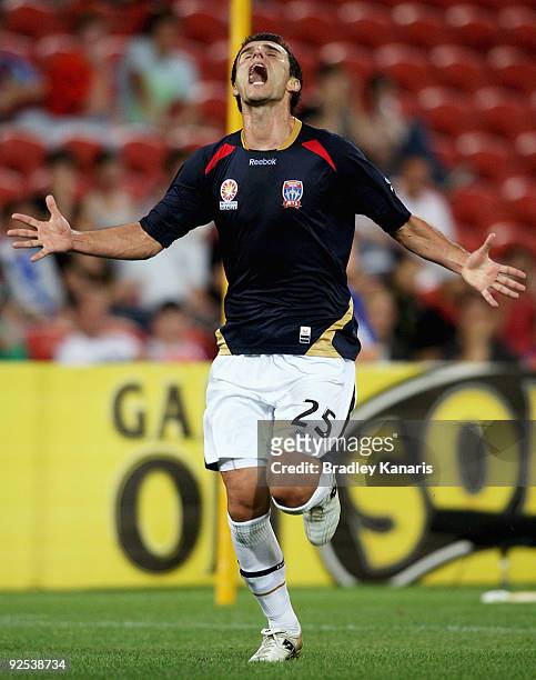 Labinot Haliti of the Jets celebrates after scoring a goal during the round 13 A-League match between the Brisbane Roar and the Newcastle Jets at...