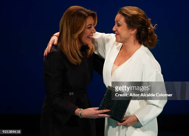 Spanish singer Nina Pastori receives the medal on hands of President of Andalusia Susana Diaz during the Medal of Andalucia awards 2018 at the Teatro...