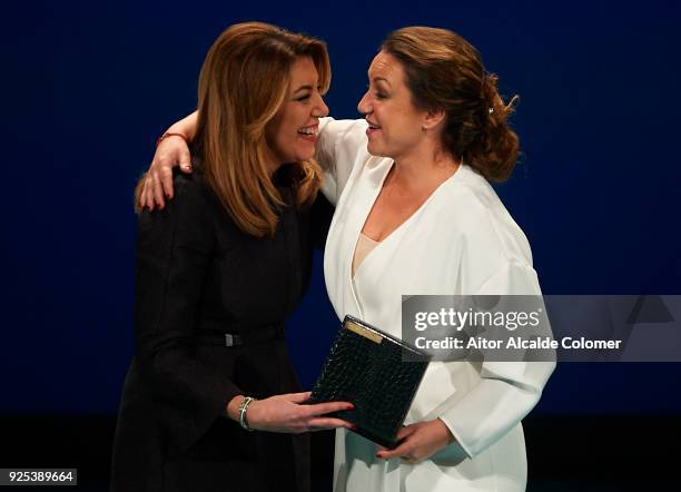 Spanish singer Nina Pastori receives the medal on hands of President of Andalusia Susana Diaz during the Medal of Andalucia awards 2018 at the Teatro...