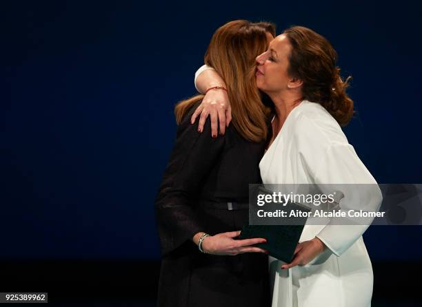 Spanish singer Nina Pastori receives the medal on hands of President of Andalusia Susana Diaz during the Medal of Andalucia awards 2018 at the Teatro...