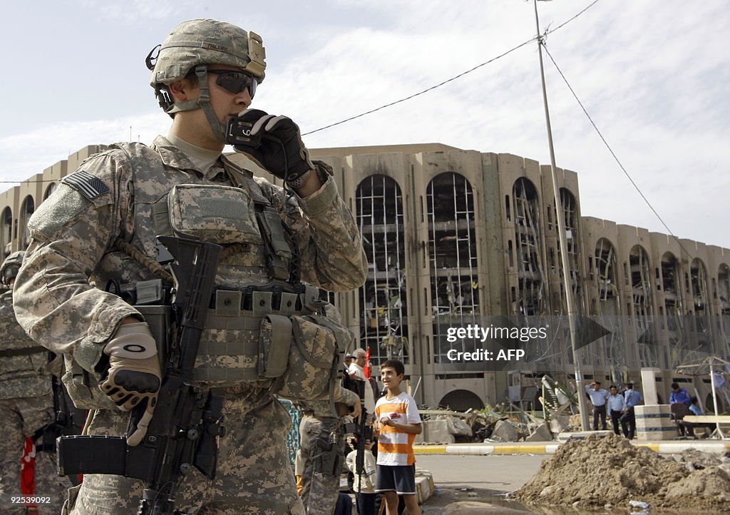 A US soldier surveys the area of the des