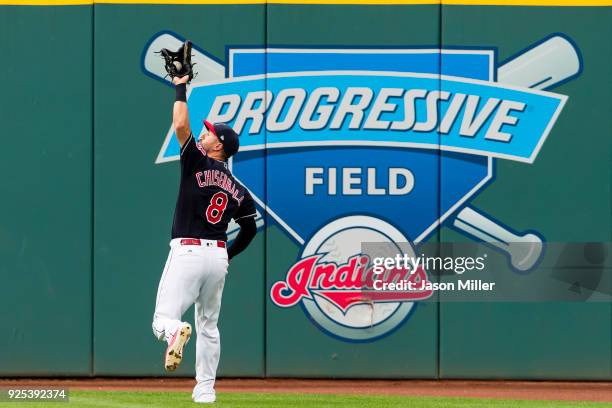 Right fielder Lonnie Chisenhall of the Cleveland Indians catches a fly ball hit by Manuel Margot of the San Diego Padres during the fourth inning at...